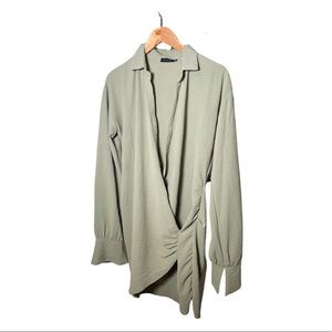 Dressy olive green mini dress.  Loose on the top tight on the bottom